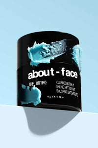 jar with 'about-face' branding on a light blue background